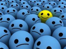 one yellow ball among blue